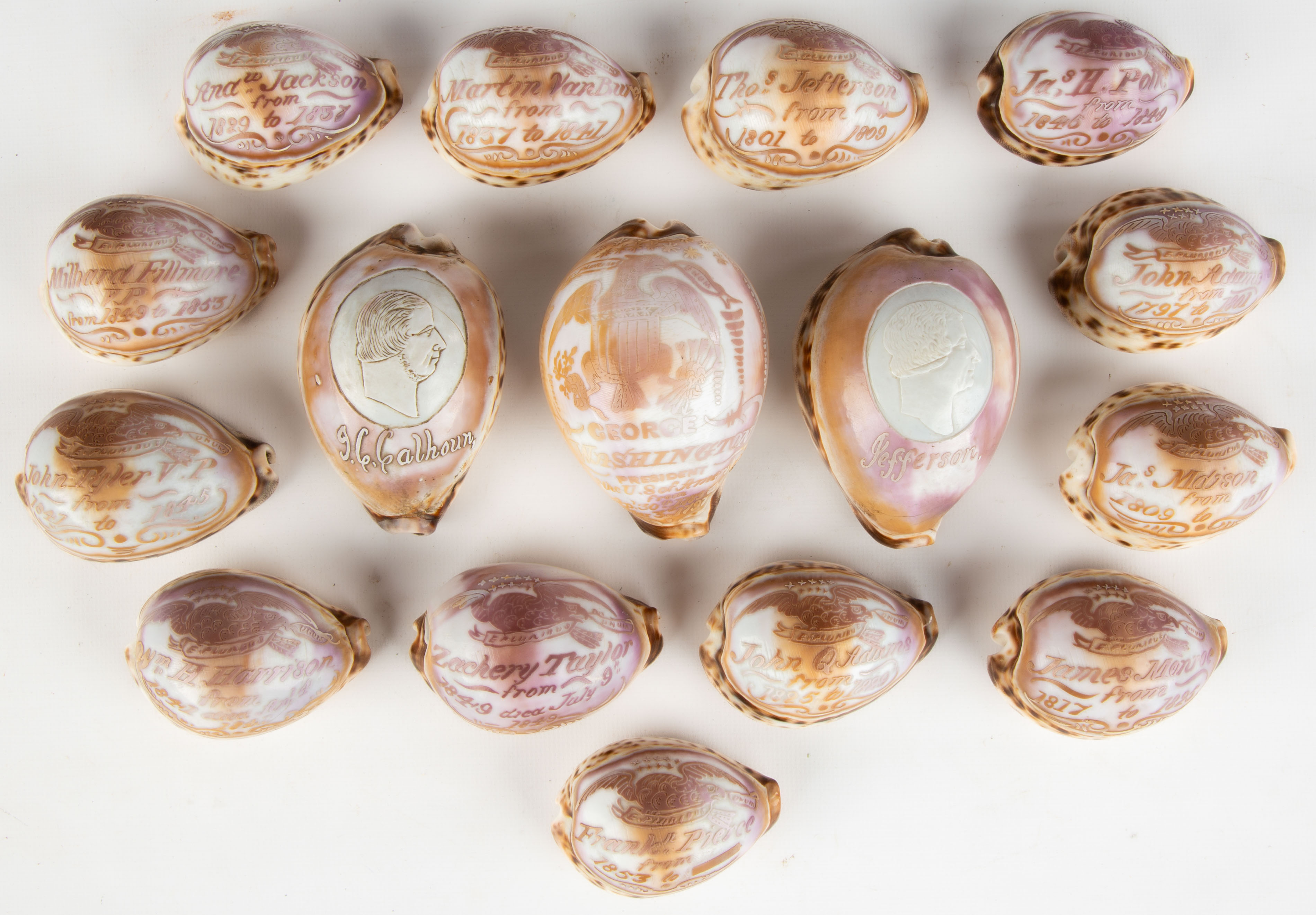 Appraisal: TH CENTURY CARVED COWRIE SHELLS WITH AMERICAN PRESIDENTS decorated with