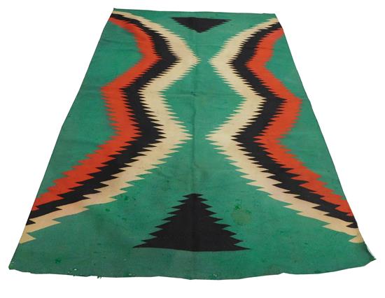 Appraisal: TRIBAL Navajo eye dazzler blanket c green ground with two