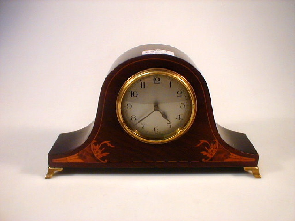 Appraisal: A mahogany marquetry mantel clock on brass oge feet high