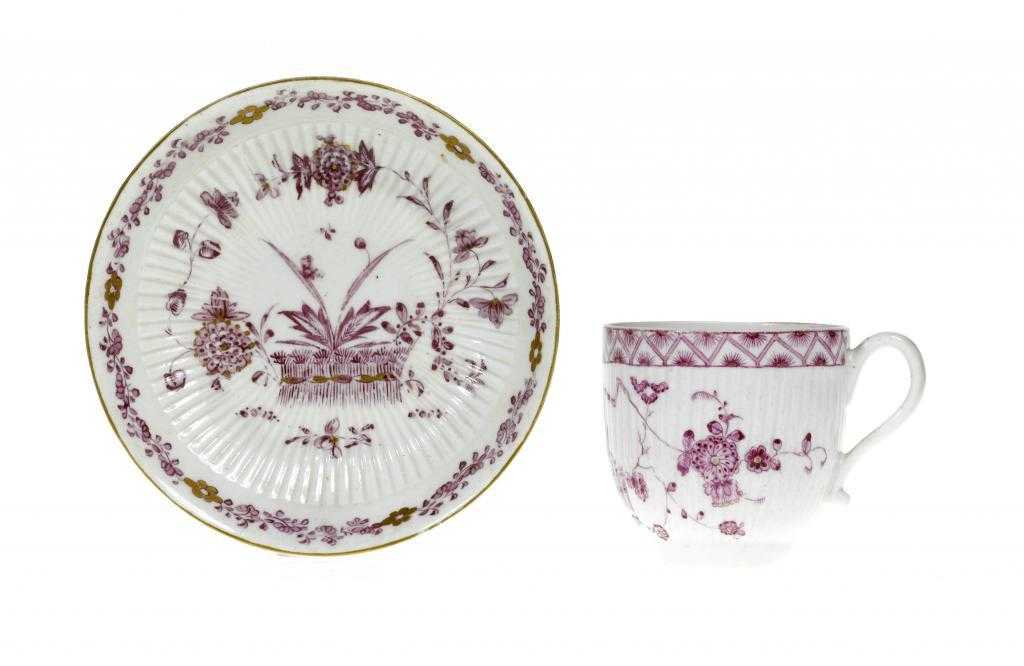 Appraisal: A DERBY REEDED COFFEE CUP AND A SAUCER painted in