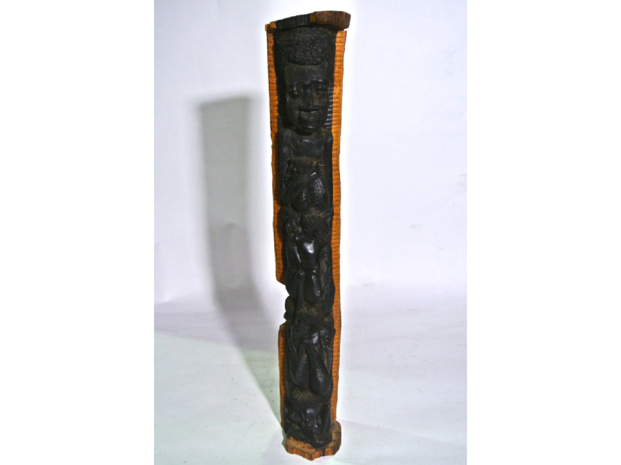 Appraisal: A th century east African carved hardwood sculpture totem of