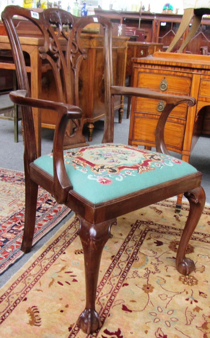 Appraisal: A set of eight George III style dining chairs with