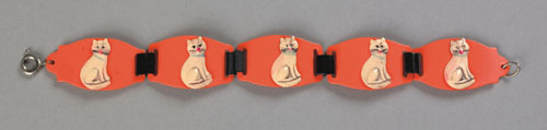 Appraisal: Orange celluloid link bracelet with applied cat figures together with