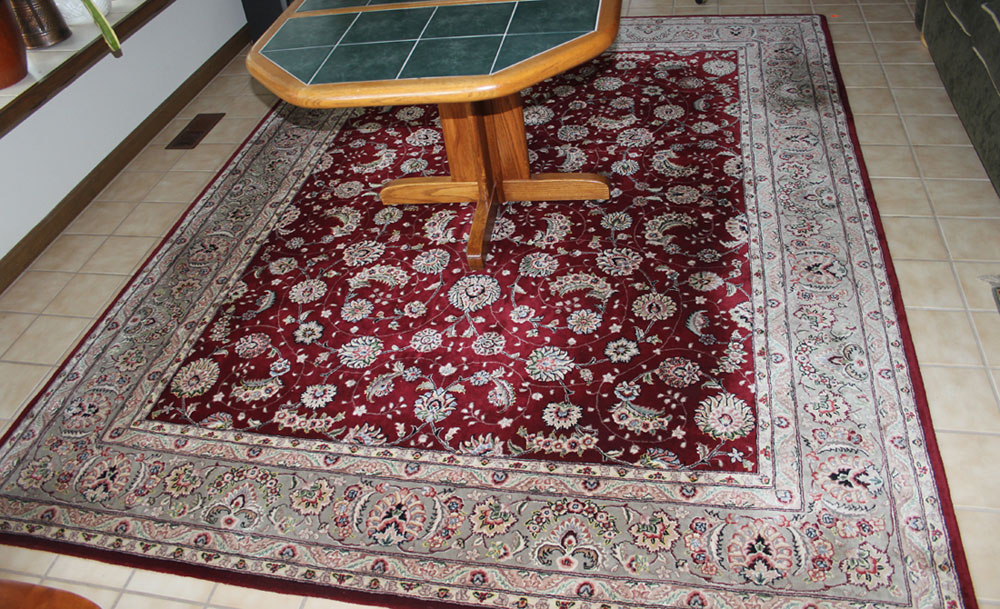 Appraisal: Area rugs including Persian design tufted rug approx x machine