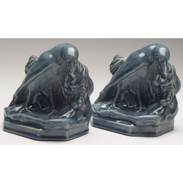 Appraisal: Rookwood bookends rooks covered in a blue hi-glaze executed by