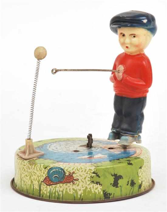 Appraisal: TINPLATE AND PLASTIC GOLFER English red blue and cream plastic