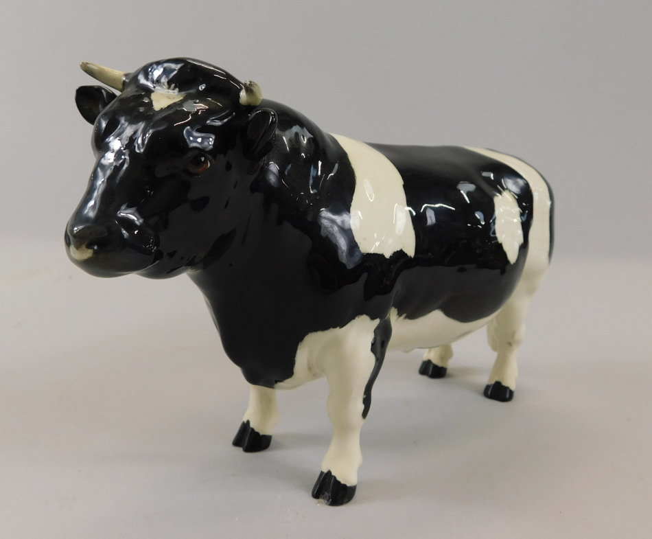 Appraisal: A Beswick model of a Fresian Bull Champion Coddington Hilt