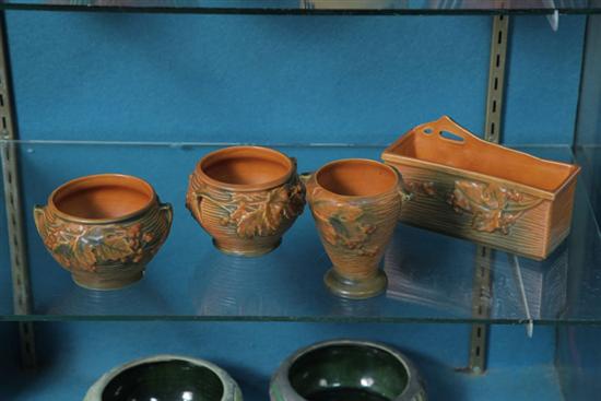 Appraisal: FOUR PIECES OF ROSEVILLE POTTERY All in brown Bushberry pattern