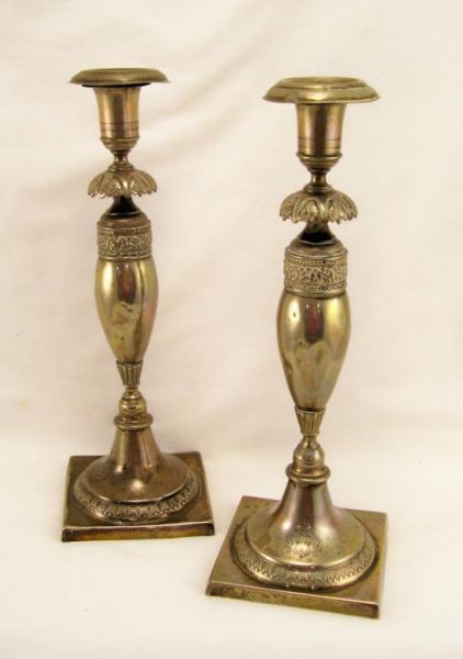 Appraisal: Pair Sterling Candlesticks Marked FEC with hallmarks Family crest engraved