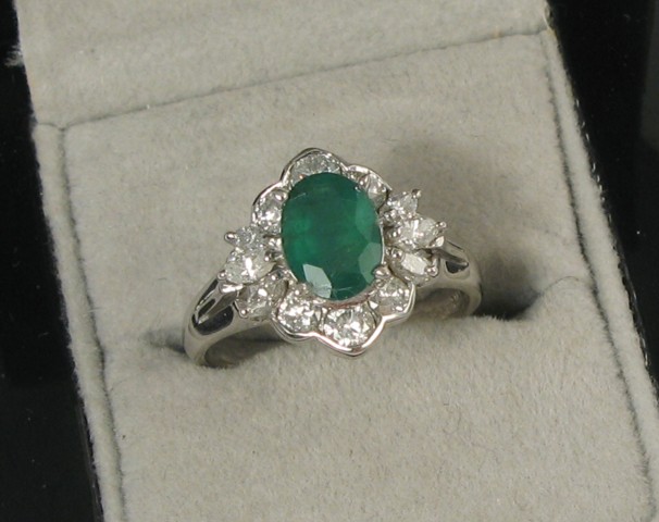 Appraisal: EMERALD DIAMOND AND WHITE GOLD RING The k white gold