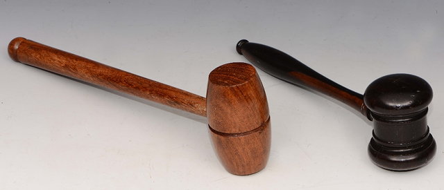 Appraisal: AN EBONISED AUCTIONEERS GAVEL with ring turned handle cm long