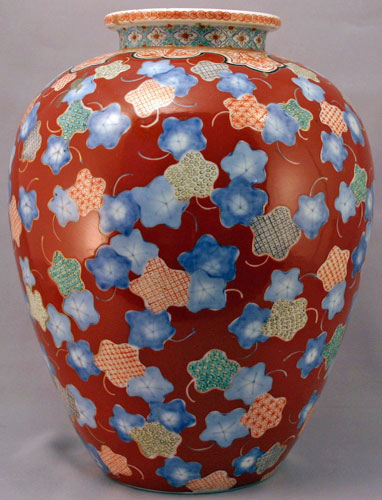 Appraisal: POLYCHROME CHINESE VASE Ox blood ground with polychrome leaf design