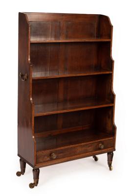 Appraisal: A Regency mahogany crossbanded waterfall bookcase with original handles and