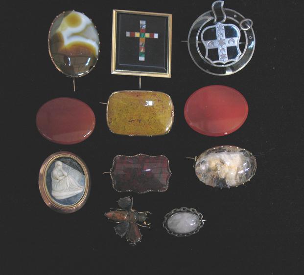 Appraisal: A QUANTITY OF VARIOUS HARDSTONE BROOCHES including rock crystal cornelian