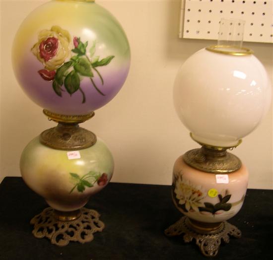 Appraisal: Two Victorian oil lamps both with floral motif one with