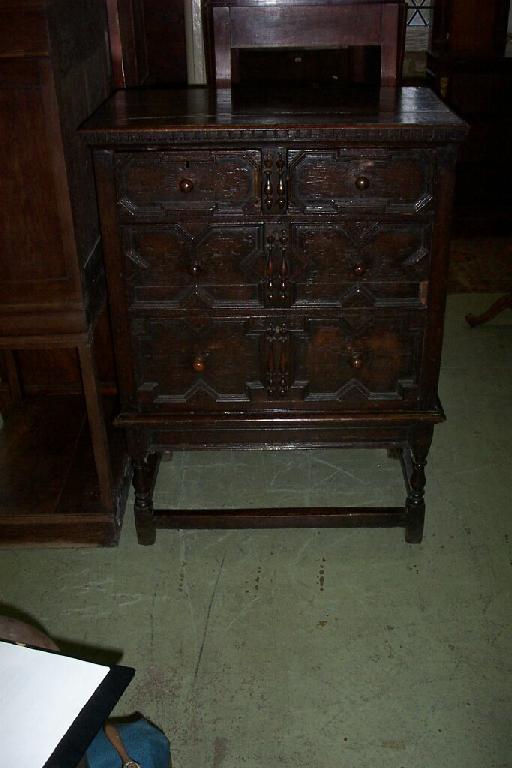 Appraisal: An th century oak chest on stand the chest of