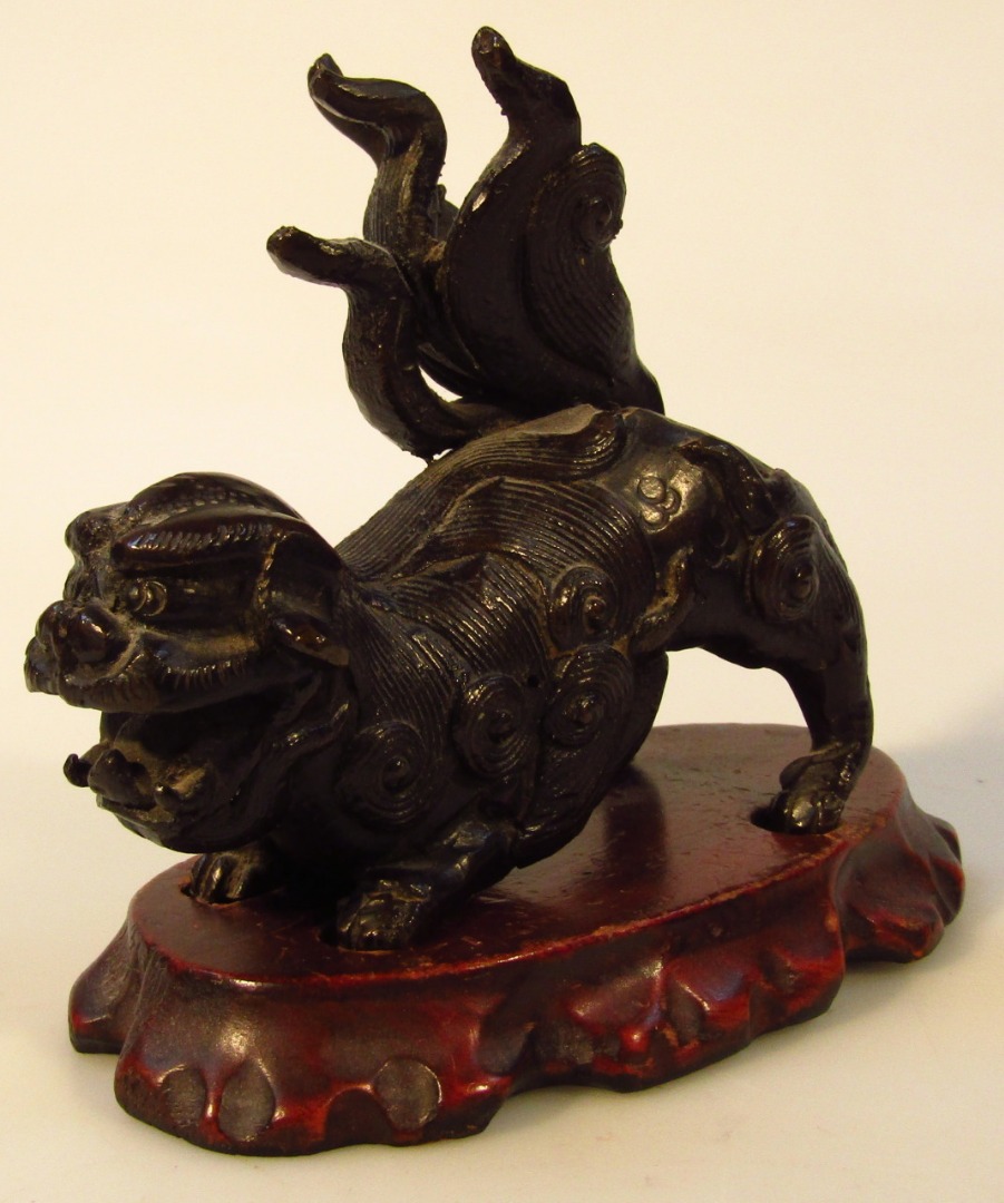 Appraisal: A Japanese Taisho period bronzed figure of a temple dog