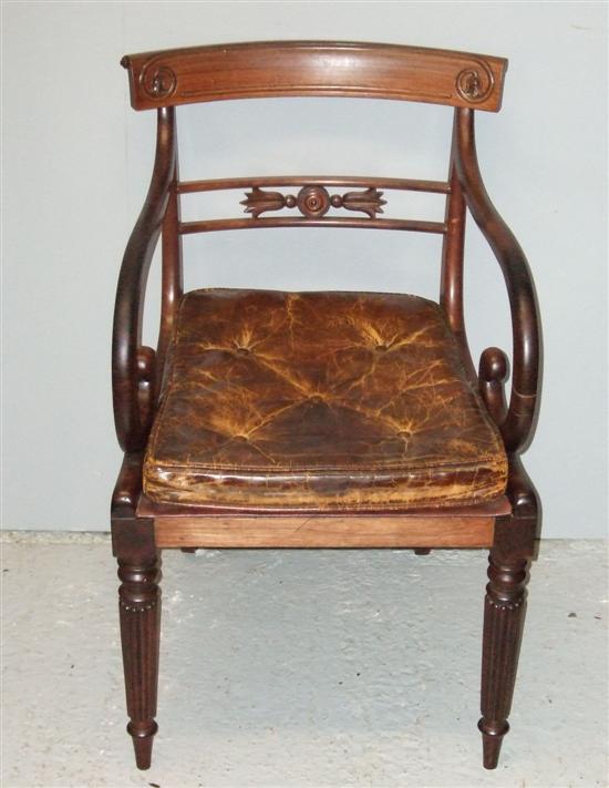 Appraisal: th century Regency rosewood bar back open arm chair