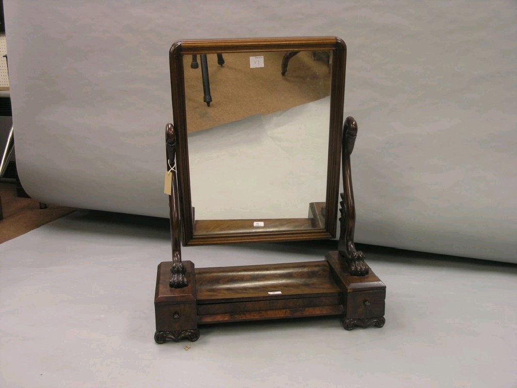 Appraisal: An early Victorian mahogany toilet mirror rectangular plate adjustable upon