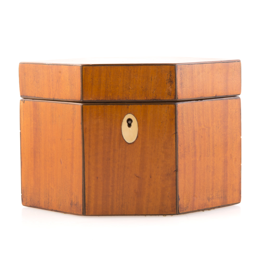 Appraisal: Regency satinwood rhomboid tea caddy circa interior with lid in