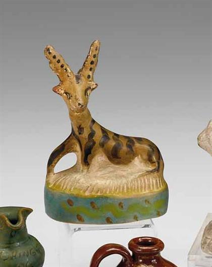 Appraisal: Painted chalkware kneeling figure of a deer probably pennsylvania th