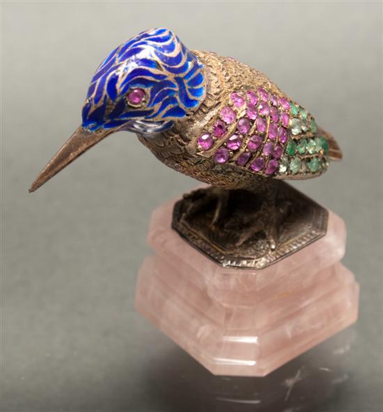 Appraisal: Silver and gemstone decorated bird figurine on carved pink stone