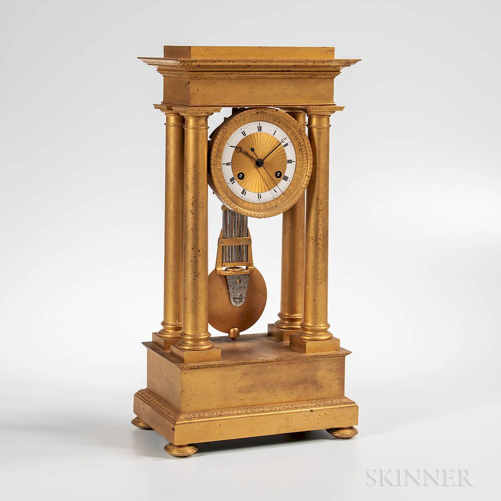 Appraisal: Fire-gilt French Portico Clock Fire-gilt French Portico Clock c Verdiere