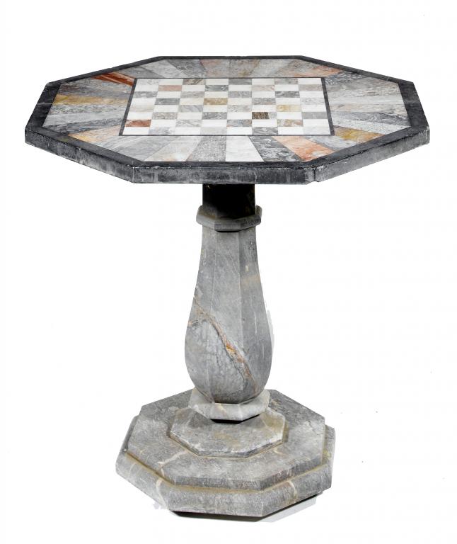 Appraisal: A MARBLE GAMES TABLE the octagonal specimen marble top on