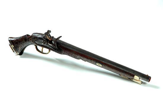 Appraisal: EXCEPTIONAL INLAID AND RAISED CARVED FLINTLOCK PISTOL Middle Eastern th