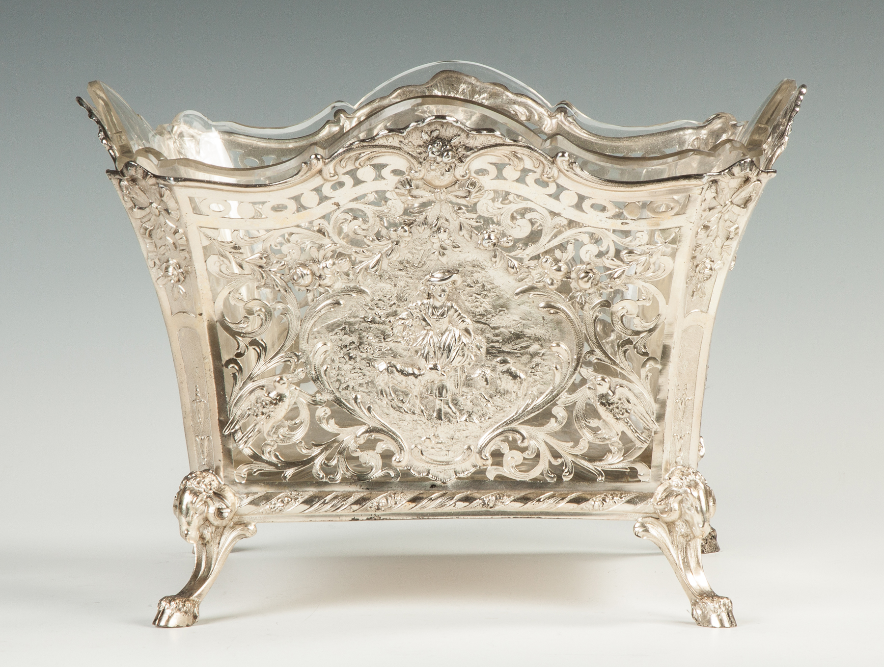 Appraisal: Continental Silver Centerpiece with Repousse Vignettes th century With rams