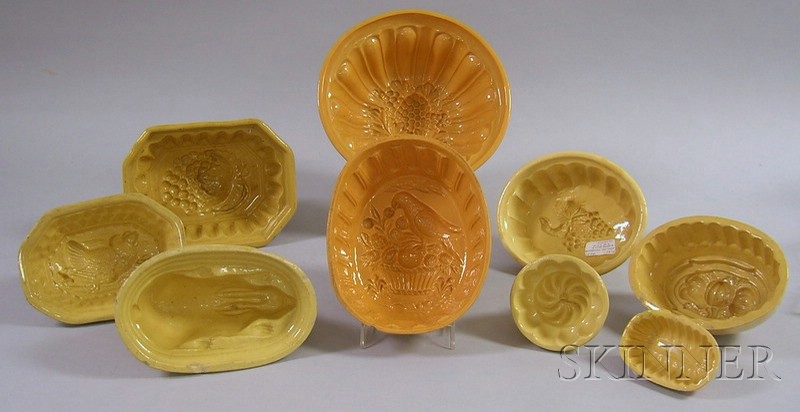 Appraisal: Nine Yellowware Culinary Molds in circular oval and rectangular shapes