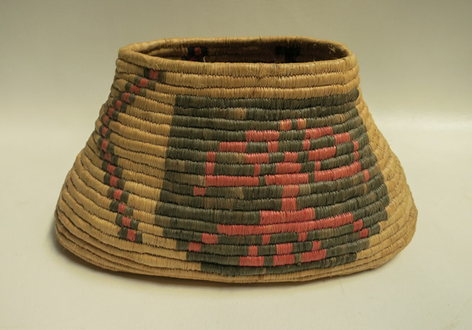 Appraisal: QUINAULT WASHINGTON NATIVE AMERICAN COILED BASKET with decoration on one