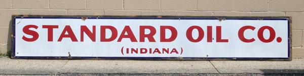 Appraisal: Long Standard Oil Co Indiana enameled tin sign mounted to