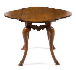 Appraisal: An Italian Fruitwood Drop-Leaf Table th century the rectangular top