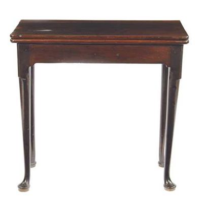 Appraisal: A mahogany tea table the hinged top above a plain