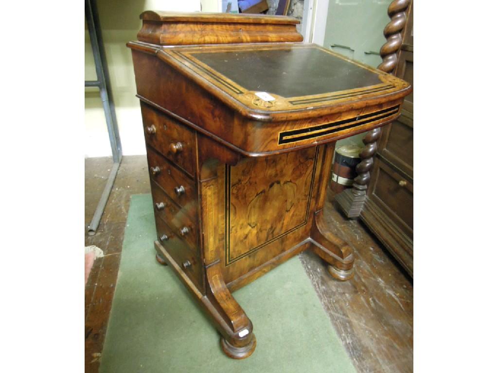 Appraisal: A Victorian figured walnut veneered Davenport with inlaid floral and