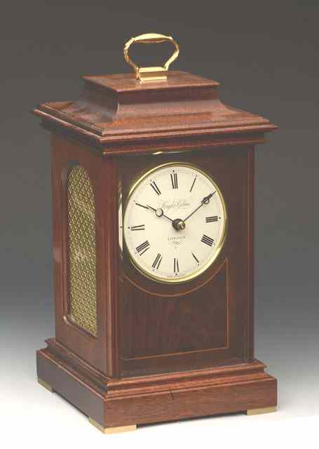 Appraisal: A LATE TH CENTURY MAHOGANY MANTEL CLOCK the white convex