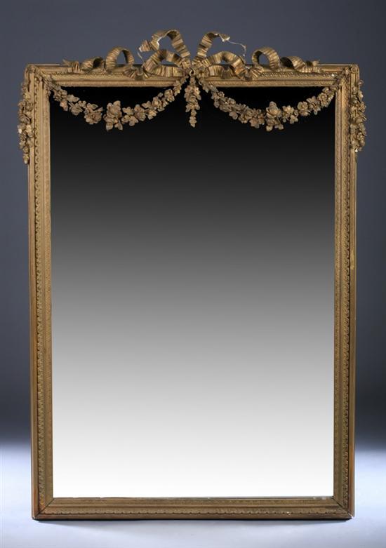 Appraisal: LOUIS XV-XVI STYLE CARVED AND GILT-WOOD UPRIGHT RECTANGULAR WALL MIRROR