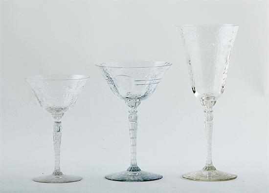 Appraisal: Engraved cut-crystal stemware set floral and garland decorated suite comprising