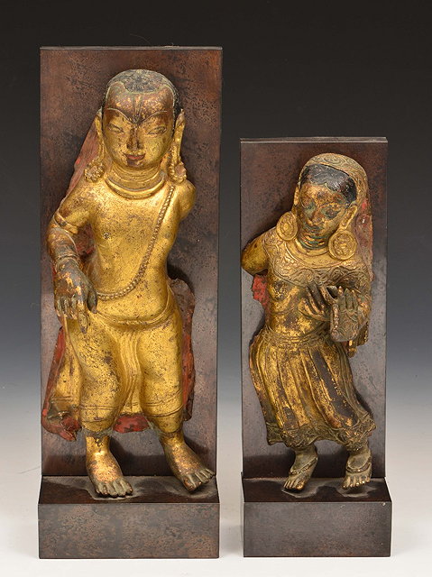 Appraisal: A NEPALESE GILT BRONZE AND POLYCHROME DEITY later mounted on