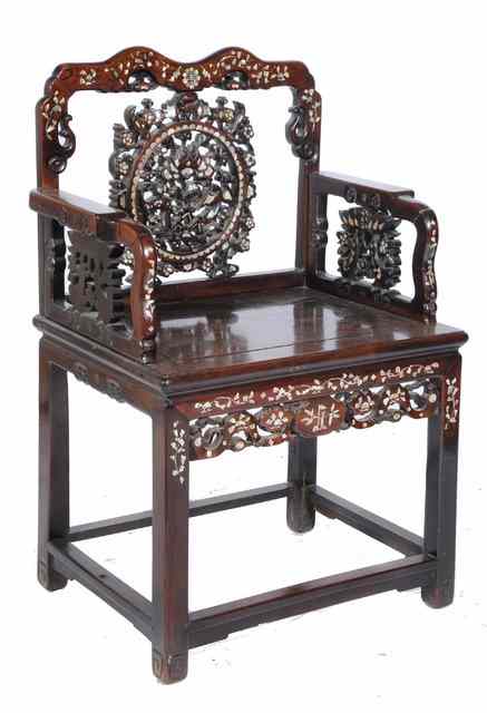 Appraisal: A CHINESE ROSEWOOD ARMCHAIR the shaped pierced back with mother