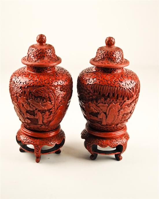 Appraisal: A Pair of th C Cinnabar Ginger Jars on Stands