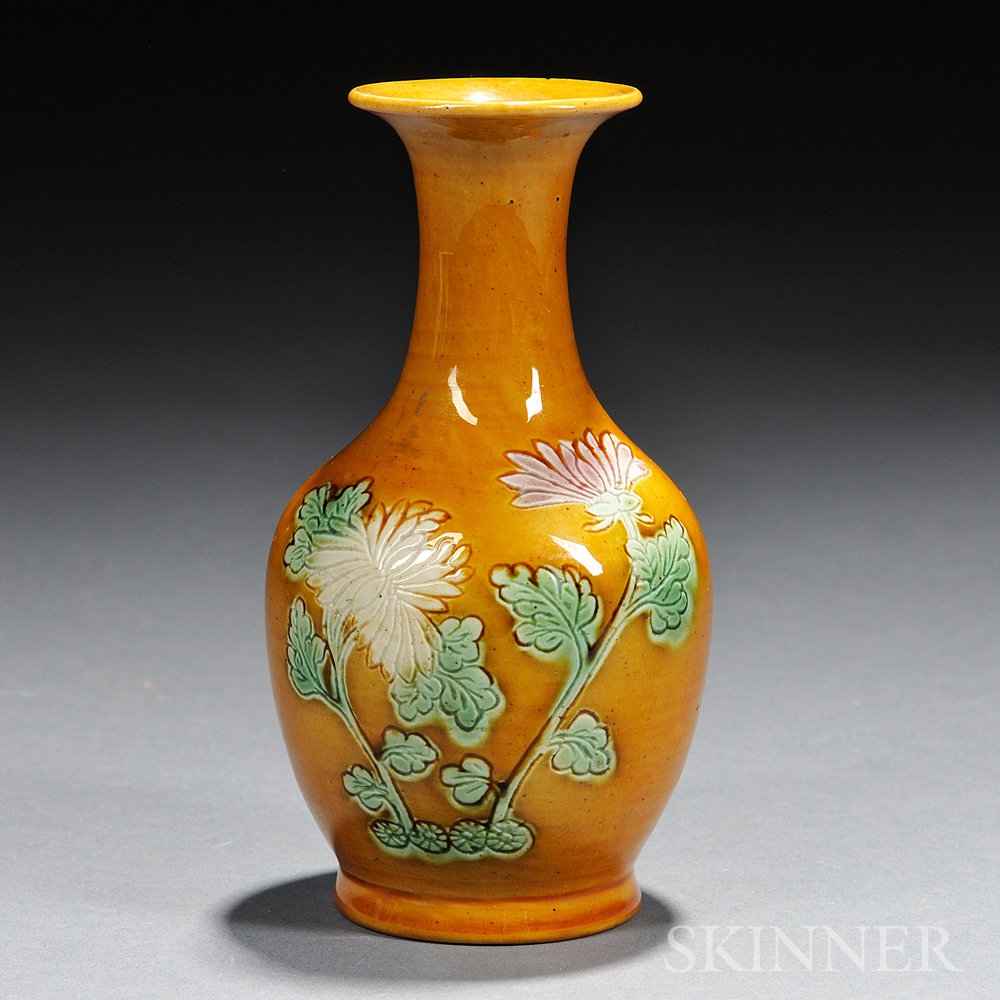 Appraisal: Mustard-glazed Vase China baluster-shape with trumpet mouth decorated with two