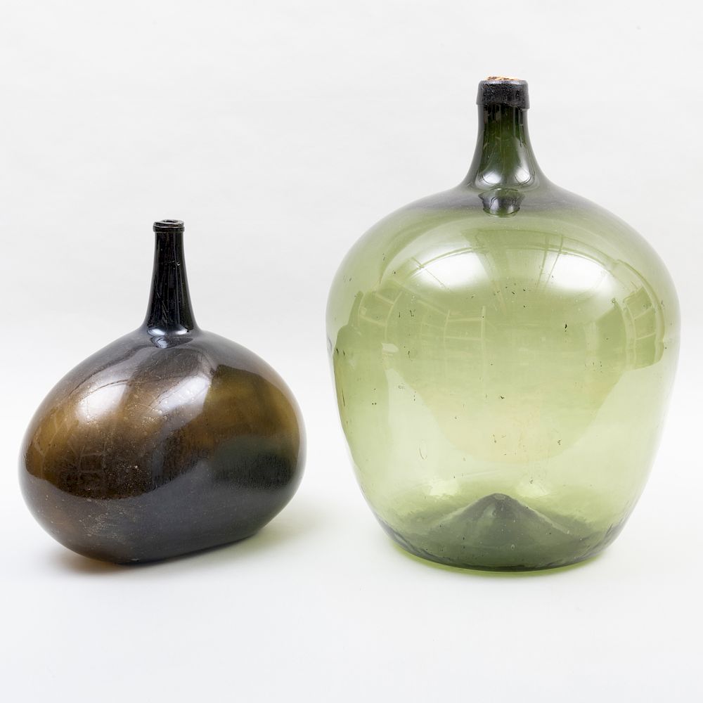 Appraisal: Two Blown Glass Demijohns The larger x in diam The