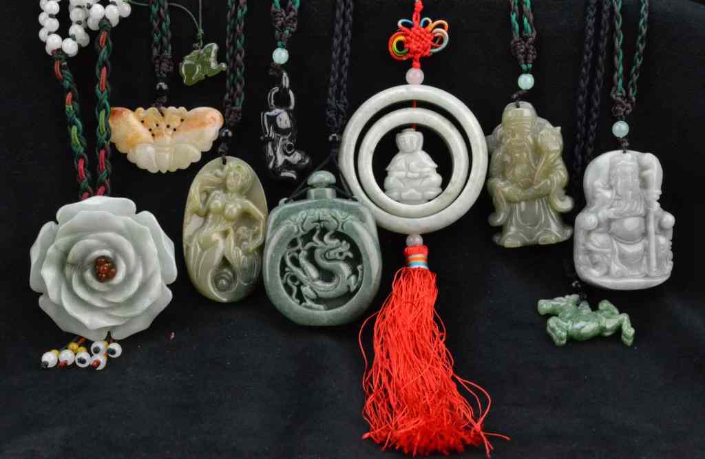 Appraisal: Chinese Jade PendantsDepicting figures dragons lotus butterflies and horses most