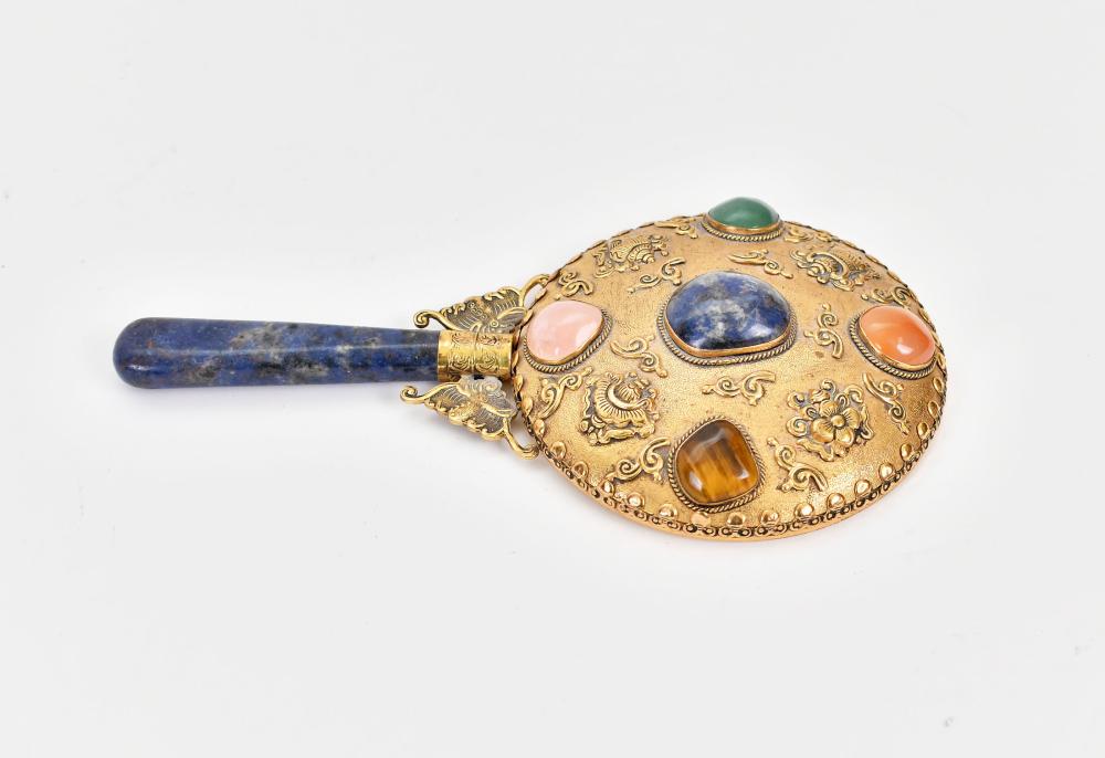 Appraisal: CHINESE STONE MOUNTED GILT METAL HAND MIRRORWith a lapis handle