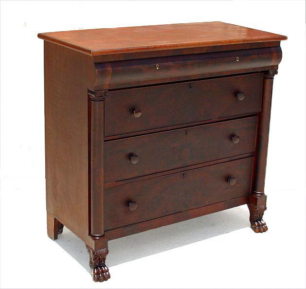 Appraisal: MAHOGANY EMPIRE CHEST OF DRAWERS over drawers with columned front