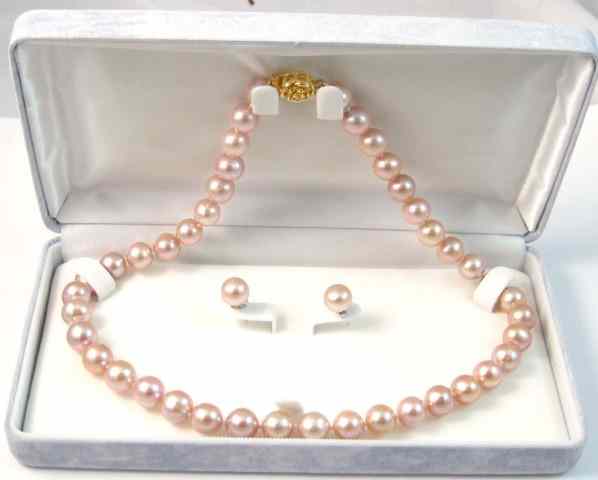 Appraisal: THREE ARTICLES OF PINK PEARL JEWELRY including a pair of