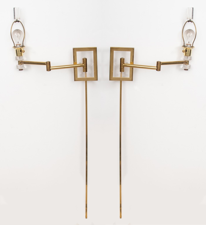 Appraisal: MODERN LUCITE GOLD TONE WALL SCONCES PAIR Pair of adjustable