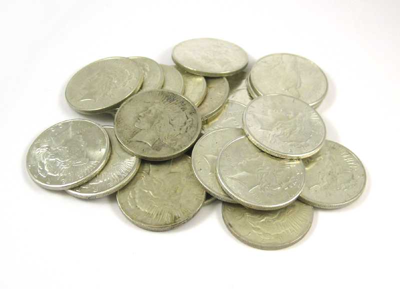 Appraisal: A ROLL OF TWENTY U S SILVER PEACE TYPE DOLLARS